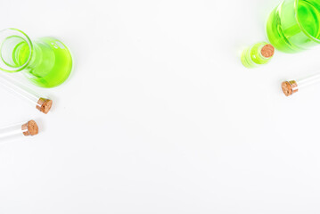 Top view science lab chemistry flask with beakers, flasks, and test tubes filled with colorful liquids