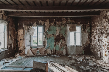 Fototapeta na wymiar Abandoned room with broken window.Interior Old wooden house in village.