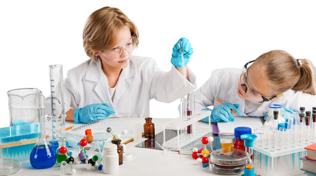Diversity children doing a chemical experiment in laboratory . Happy kids at elementary school learning science chemistry . Chemistry school concept.