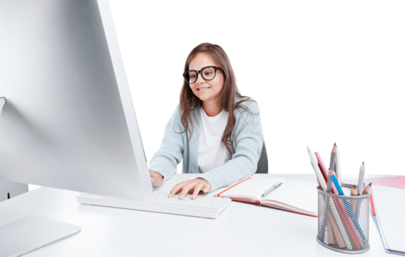Happy smiling girl student watching learning online video class on a laptop