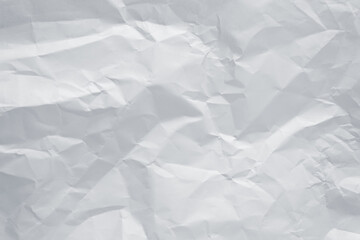 Obraz premium White crumpled paper texture background, clean white wrinkled paper, top view.