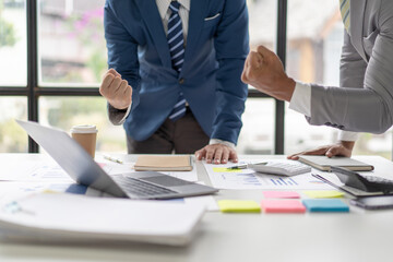 business adviser meeting to analyze and discuss the situation on the financial report in the meeting room.Investment Consultant, Financial advisor and accounting concept	