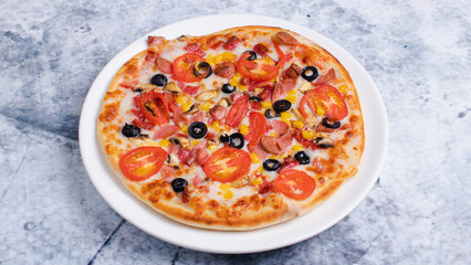 Vegetables and sausage pizza isolated