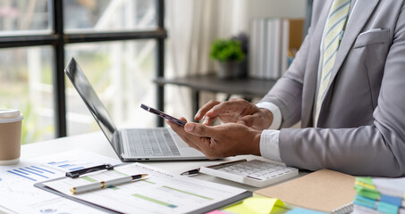 business adviser meeting to analyze and discuss the situation on the financial report in the meeting room.Investment Consultant, Financial advisor and accounting concept	