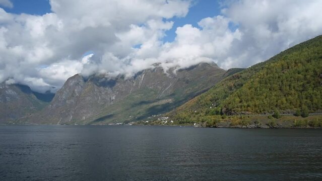 View from an electrical cruise ship on Sognefjord,  Aurlandsfjord Flam, Norway. Impressive mountain landscape of fjords and blue water