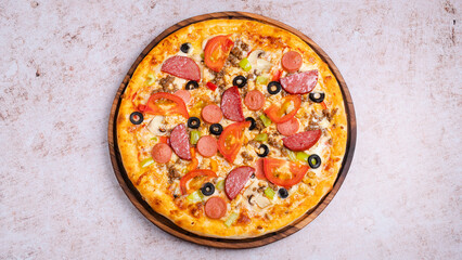  Pizza with olives, vegetables and sausages