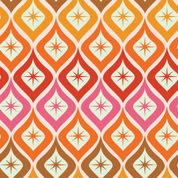 Mid century atomic starbursts on colorful ogee shapes seamless pattern in orange, yellow, red , pink and brown. For home decor, fabric and textile 