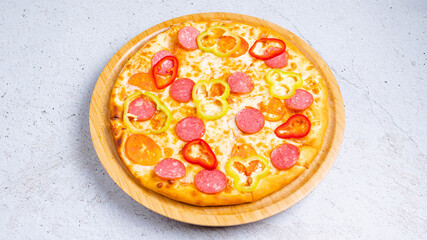 Vegetables and sausages pizza