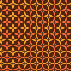 Mid Century modern atomic starbursts seamless pattern in orange and mustard yellow. For home décor, wallpaper and fabric 