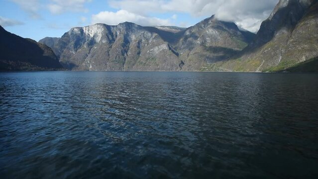 View from an electrical cruise ship on Sognefjord,  Aurlandsfjord Flam, Norway. Impressive mountain landscape of fjords and blue water