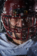 American Football Field: Lonely Athlete Warrior Standing on a Field Holds his Helmet and Ready to...