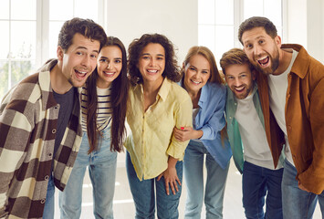 Group portrait of happy adult friends. Several young people having fun together. Six cheerful young...