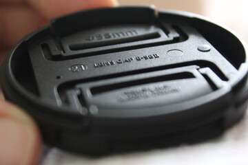 close up of a hand holding a camera