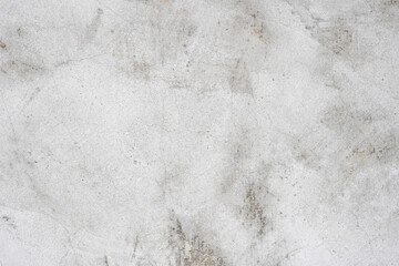 Concrete wall light gray background. Old grunge textures with scratches and cracks