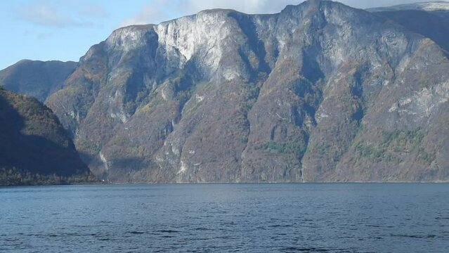 View from an electrical cruise ship on Sognefjord,  Aurlandsfjord Flam, Norway. Impressive mountain landscape of fjords and blue water