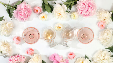 Floral composition with different varieties of rose wine, summer alcoholic cocktail for a party and...