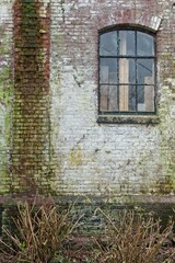 Stone weathered wall of historic old building