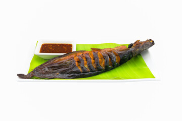 grilled catfish skewers and spicy sauce in white ceramic plate on white background,isolated