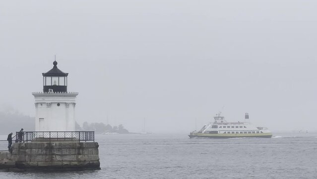 Municipal Car Ferry Approaches Bug Light in Casco Bay Portland Maine