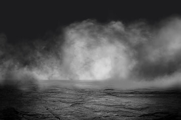 Grunge concrete floor with smoke or fog in dark room with spotlight. Asphalt night street, black background, black and white