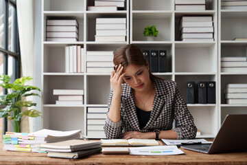 Stressed and Burnout. Business woman worry about her work at office