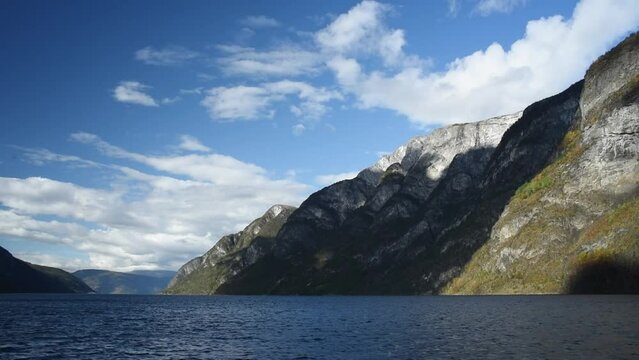 View from an electrical cruise ship on Sognefjord,  Aurlandsfjord Flam, Norway. Impressive mountain landscape of fjords and blue water