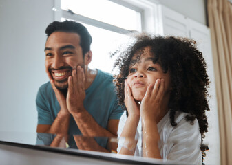 Family, children and a father with his daughter in the bathroom mirror, looking at their reflection during morning routine. Love, kids and a little girl washing her face with dad for hygiene at home