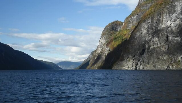 View from an electrical cruise ship on Sognefjord,  Aurlandsfjord Flam, Norway. Impressive mountain landscape of fjords and blue water