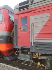 Locomotive and car on the railway