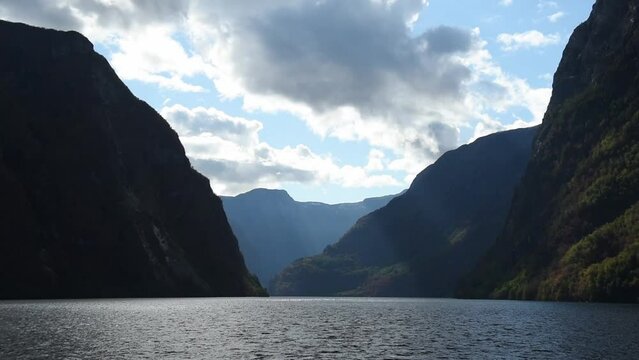 View from an electrical cruise ship on Sognefjord,  Aurlandsfjord Flam, Norway. Impressive mountain landscape of fjords and blue water