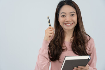 Portrait beautiful Asian woman student. Smile girl happy study. read book in college campus. young female on international Asia University. Education, study, school, learning, exam, continue education