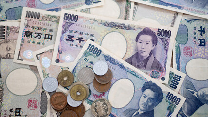 Japanese Yen money. close up of the Japanese yen on hand. currency of Japan that is used to change,...