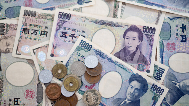 Japanese Yen Money. Close Up Of The Japanese Yen On Hand. Currency Of Japan That Is Used To Change, Buy, Sell, Accumulate, Invest, Financial, Exchange Rate, Value, Accounting, International Exchange