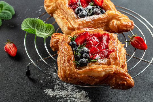 danish pastry puff pastry, strawberry and honey, Restaurant menu, dieting, cookbook recipe top view