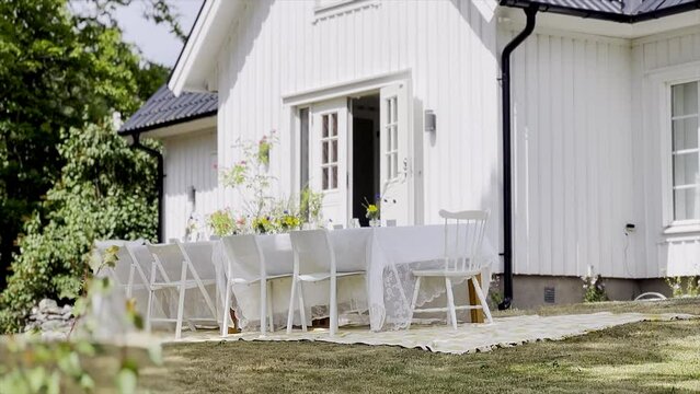 white house in the garden midsummer table