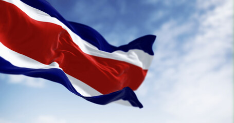 Costa Rica national civil flag waving in the wind on a clear day