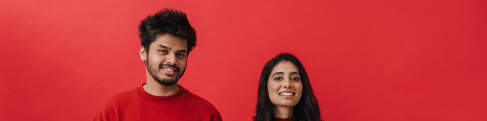 Young indian couple laughing while posing together