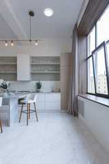 close view kitchen with dinning marble table and hight bar stools in minimalistic light elegant luxury design of a modern spacious studio apartment in soft pastel beige colors