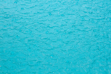 Raindrops on tropical aqua waters