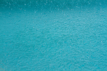 Raindrops on tropical aqua waters