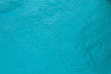 Raindrops on tropical aqua waters