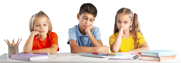 Concept of education. Elementary school child, ready to answer the teacher's questions in class. Smart little is sitting at a desk next to her classmate in the classroom.