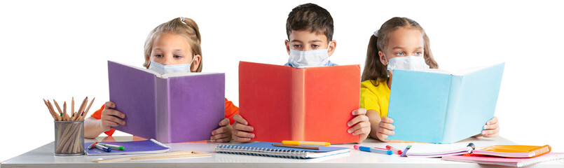 Children reading books sitting for table