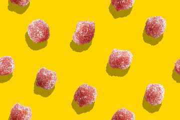 Gummy Seamless Pattern on Yellow Background- Sour Strawberry Gummies - Sugar Coated Gummy Candies -...