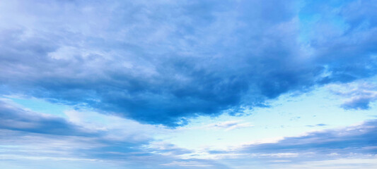 Obraz premium Blue sky background with white clouds. Beauty bright air background. Gloomy vivid cyan landscape.