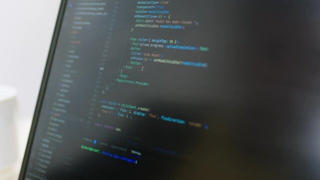 The programmer writes a program code, creating a program, on the screen, close