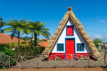 Fototapeta na wymiar Tourism office in a traditional triangular madeiran house in the island of Madeira, Portugal