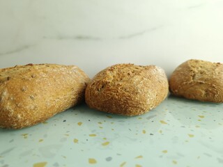 Wholemeal buns on table