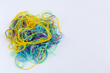 multi color tangled thread isolated on white background