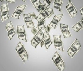 Hundred dollars money banknotes fly